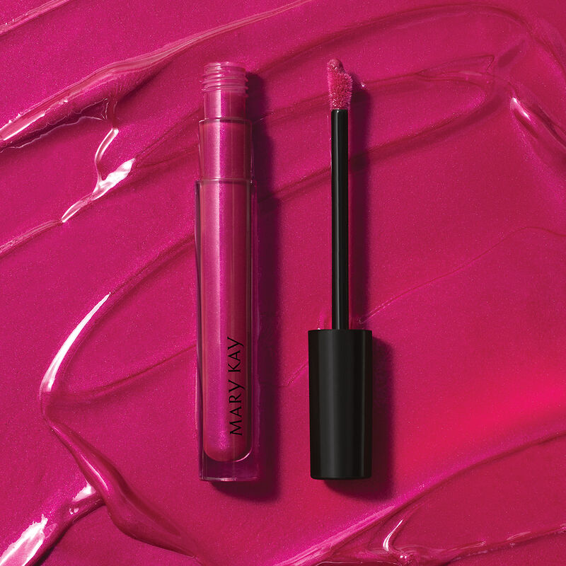 Tube ouvert du Brillant &agrave; l&egrave;vres Mary Kay Unlimited Baie succulente sur un frottis de la teinte.