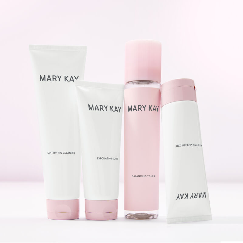 Entire line of Mary Kay Skin Care featuring a complete mattifying routine standing against light pink background image number null