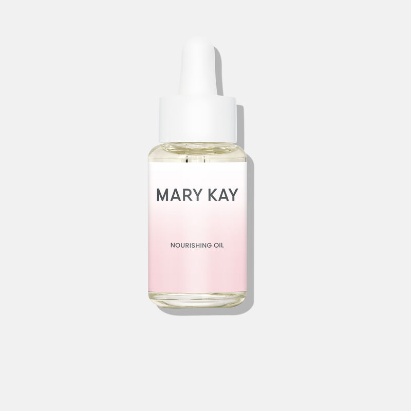 NEEDS GREY BACKGROUND: Closed bottle of Mary Kay Nourishing Oil standing against plain background.