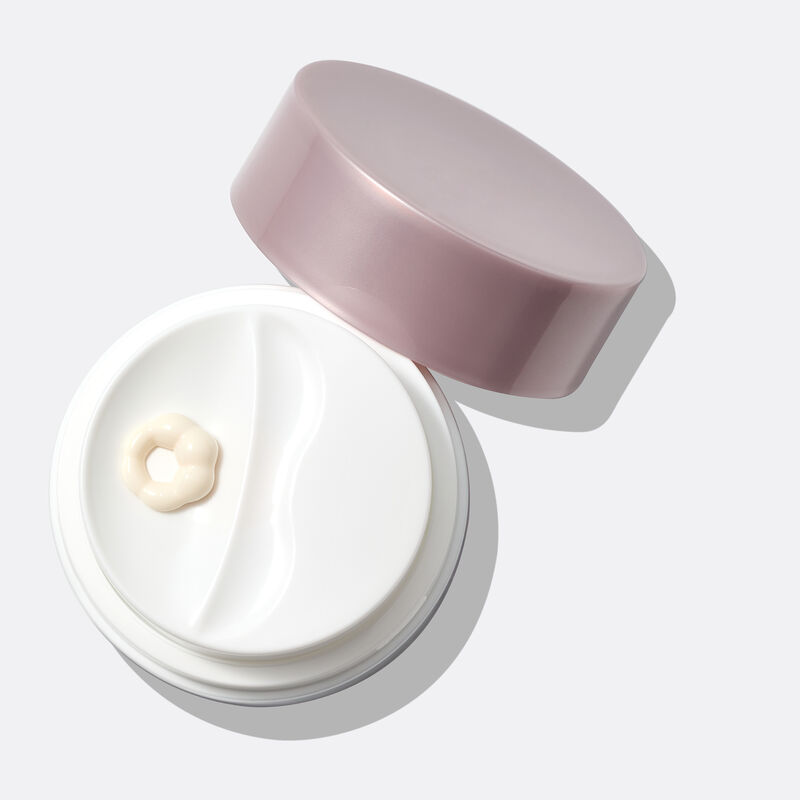 Close-up of Day Cream open jar with formula on top