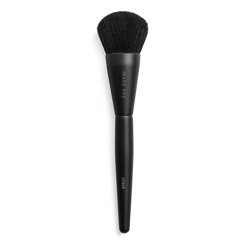 Pinceau pour les joues Mary Kay sur un fond uni