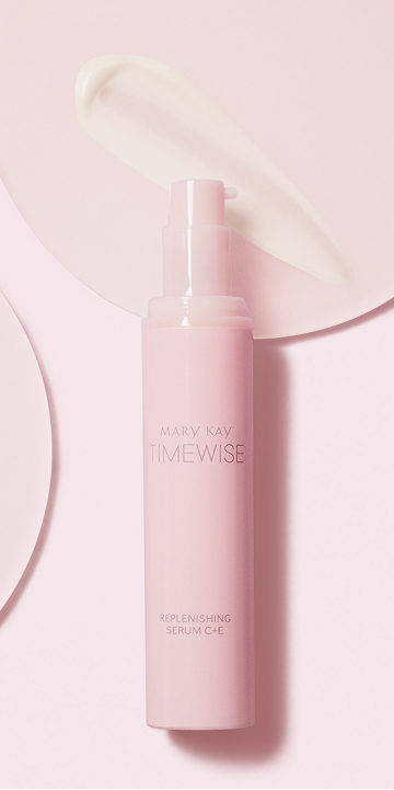 Bouteille de S&eacute;rum r&eacute;g&eacute;n&eacute;rateur C+E TimeWise sur un fond rose avec un frottis du produit.